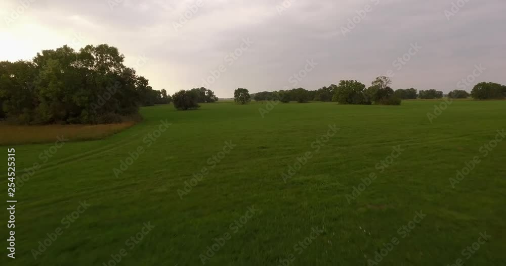 Aerial shot, wooded wilderness, sunset Aerial shot, wooded wilderness, sunset