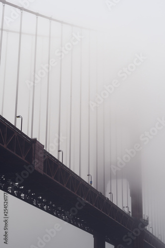 Heavy morning fog surrounds the Golden Gate Bridge