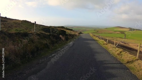 A time lapse video of going down a country road in Ireland