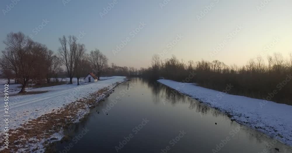 Frozen Balaton lake, aerial shot, winter season, sunrise Frozen Balaton lake, aerial shot, winter season, sunrise
