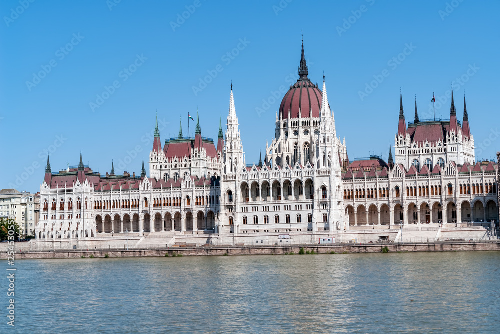 Hungarian Parliament Building in Budapest with Danube river in foreground - Budapest, Hungary