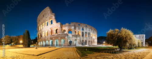 Rome, Italy. Colosseum Also Known As Flavian Amphitheatre In Evening Or Night Time.