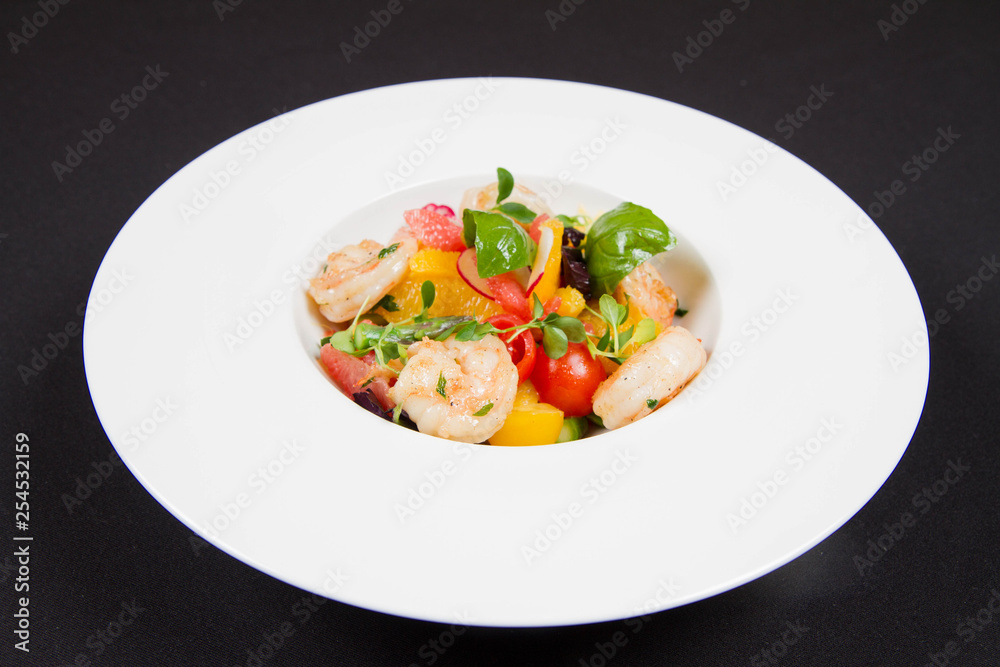 Shrimp, vegetables and fruit salad (with tomato, asparagus, radish, grapefruits, basil)