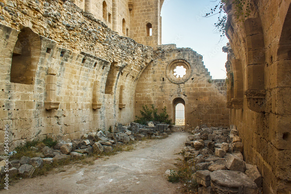 Ruins of the Abbey of Bellapais in the Northern Cyprus. Bellapais Abbey is the ruin of a monastery built by Canons Regular in the 13th century near the Kyrenia (Girne).