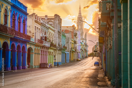 Street scene with sunset in downtown Havana