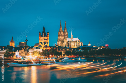 Great St. Martin Church And Dom In Cologne At Evening With Reflection In River Rhine, Germany