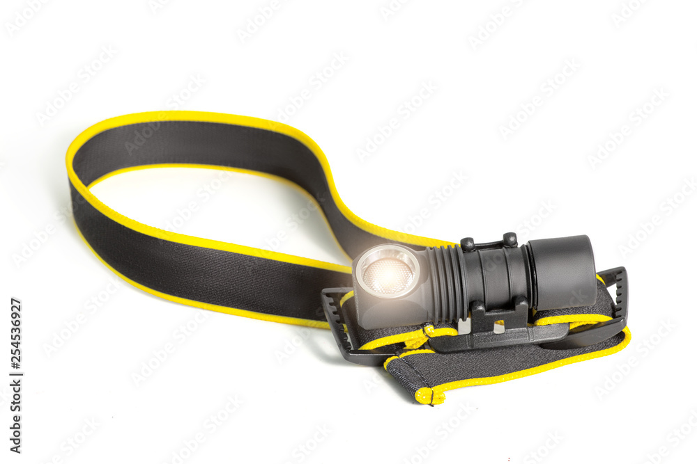 Head lamp flashlight with light beam studio shot Head lamp flashlight with light beam studio shot
