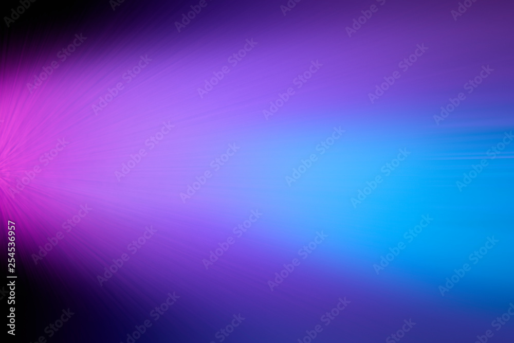 Scattered ray of light with elements of pink and blue in blur