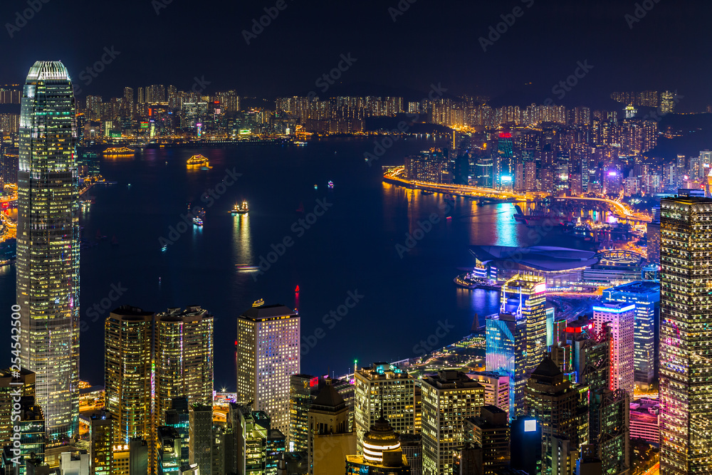 Hong Kong city view from The Peak at night, Victoria Harbor view from Victoria Peak at night, Hong Kong.