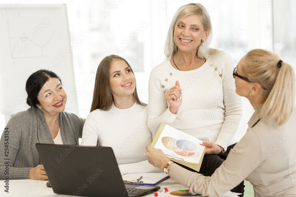 Group of businesswomen working together Group of businesswomen working together