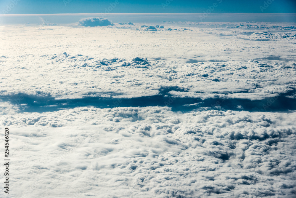 Obraz premium Top view of white clouds above the ground or water