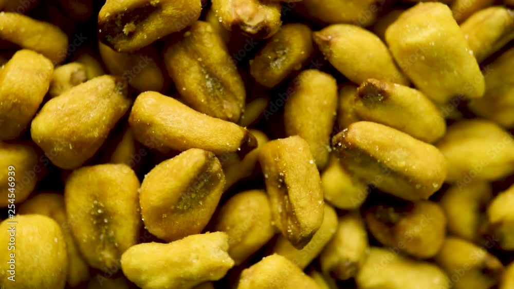 Close up rotation of toasted corn kernels spinning in circular rotation. Close up rotation of toasted corn kernels spinning in circular rotation.