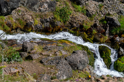 Small stream of water through rocky landscape