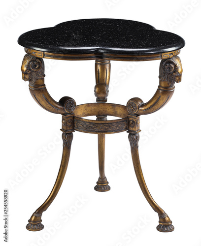 Small table black marble top ram head legs with clipping path.