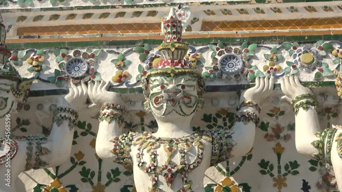 Sculptures of demons-Rakshasa, Buddhist temple Wat Arun. Bangkok, Thailand photo