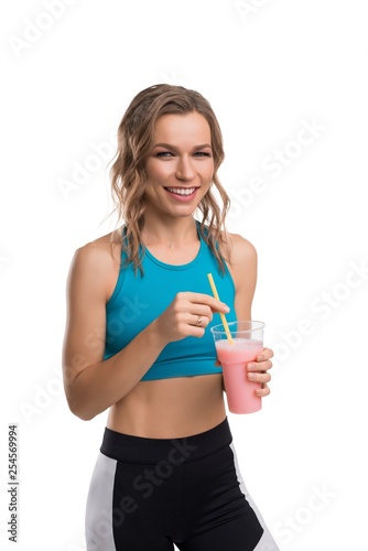 Happy blonde in sportswear cropped isolated shot