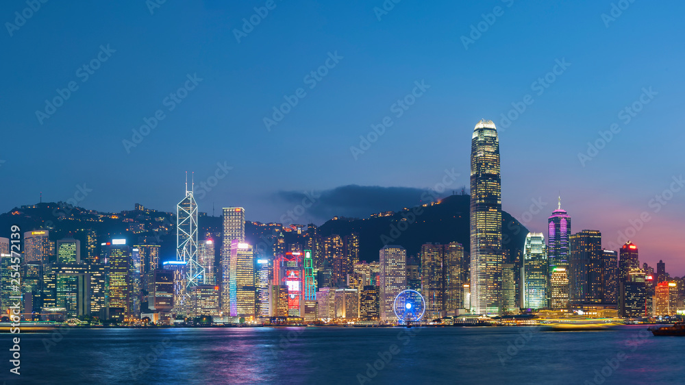 Fototapeta premium Panorama of Victoria Harbor in Hong Kong at dusk