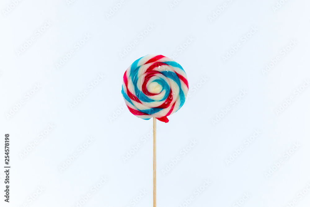 colorful handmade swirl lollipop isolated on white background. multicolored lollipop, Tasty colorful fruit flavored candy. striped lollipop.sweet candy making from sugar on white background. colorful handmade swirl lollipop isolated on white background. multicolored lollipop, Tasty colorful fruit flavored candy. striped lollipop.sweet candy making from sugar on white background.