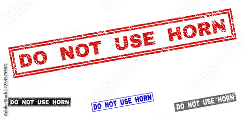 Grunge DO NOT USE HORN rectangle stamp seals isolated on a white background. Rectangular seals with grunge texture in red, blue, black and grey colors.