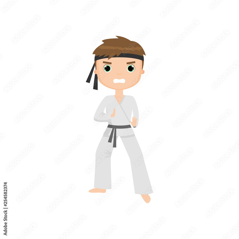 Focused and angry cute little boy doing karate isolated on white background