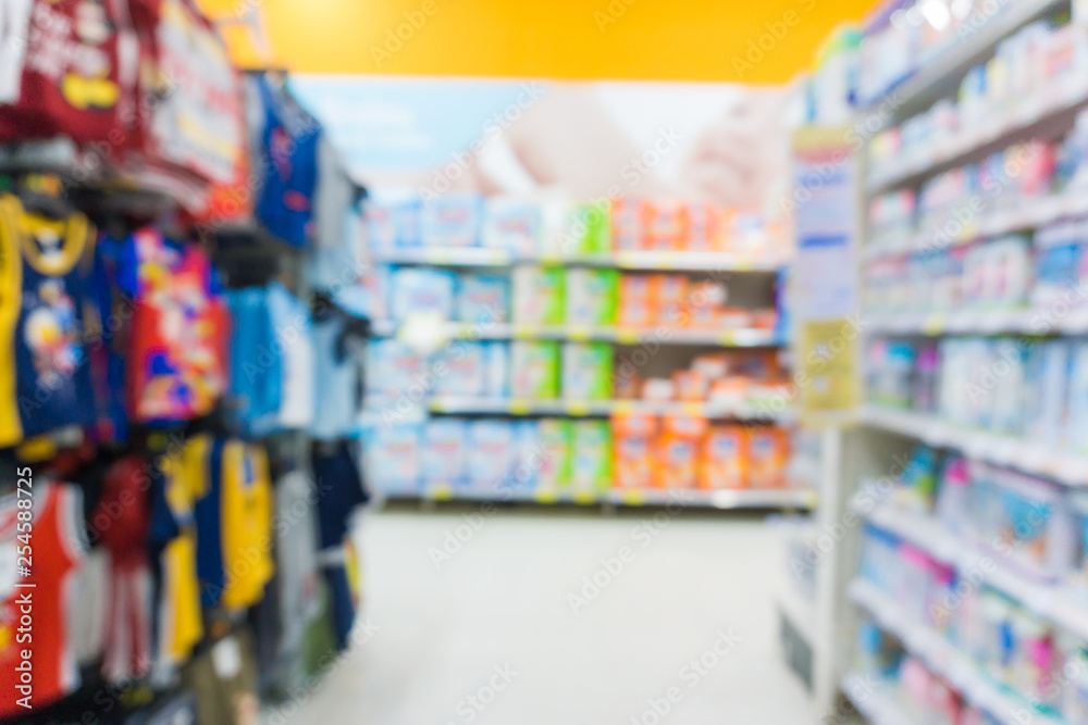 Abstract blurred row of goods in modern trade supermarket