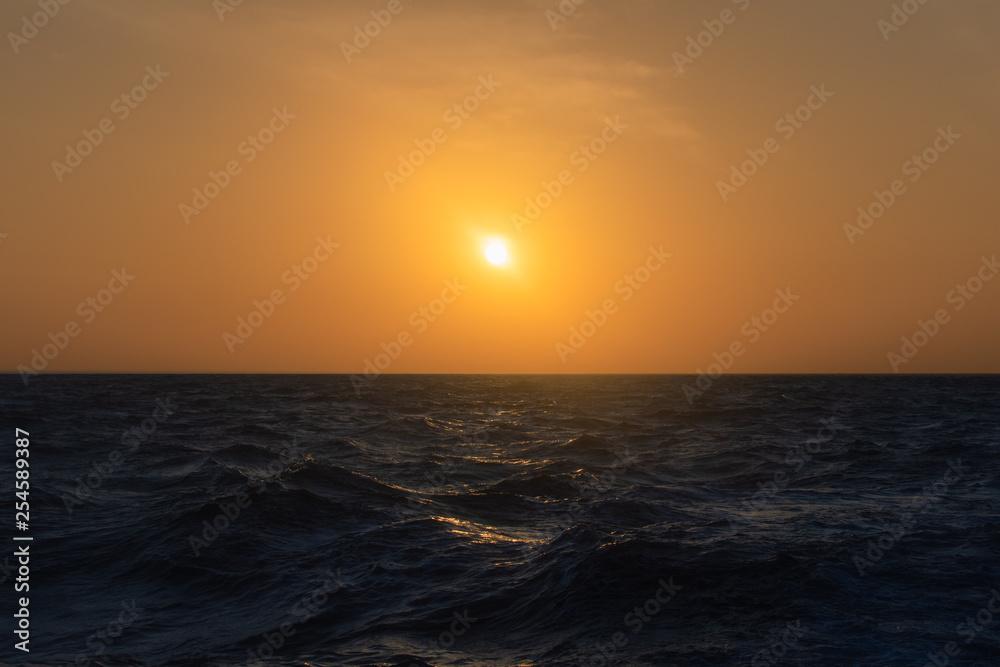 Sunset over Blue Ocean