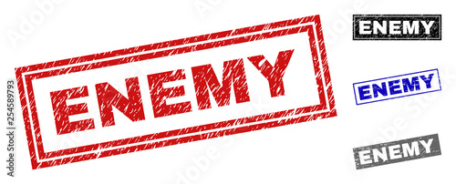 Grunge ENEMY rectangle stamp seals isolated on a white background. Rectangular seals with grunge texture in red, blue, black and grey colors.