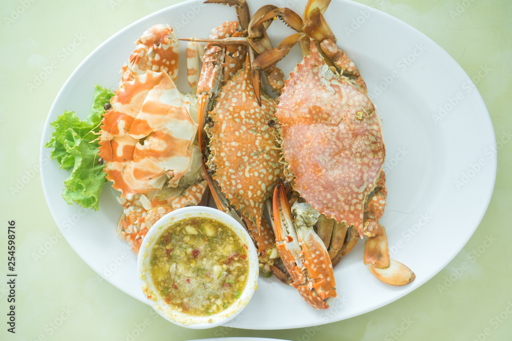 Sea crab grilled serve with sauce Sea crab grilled serve with sauce