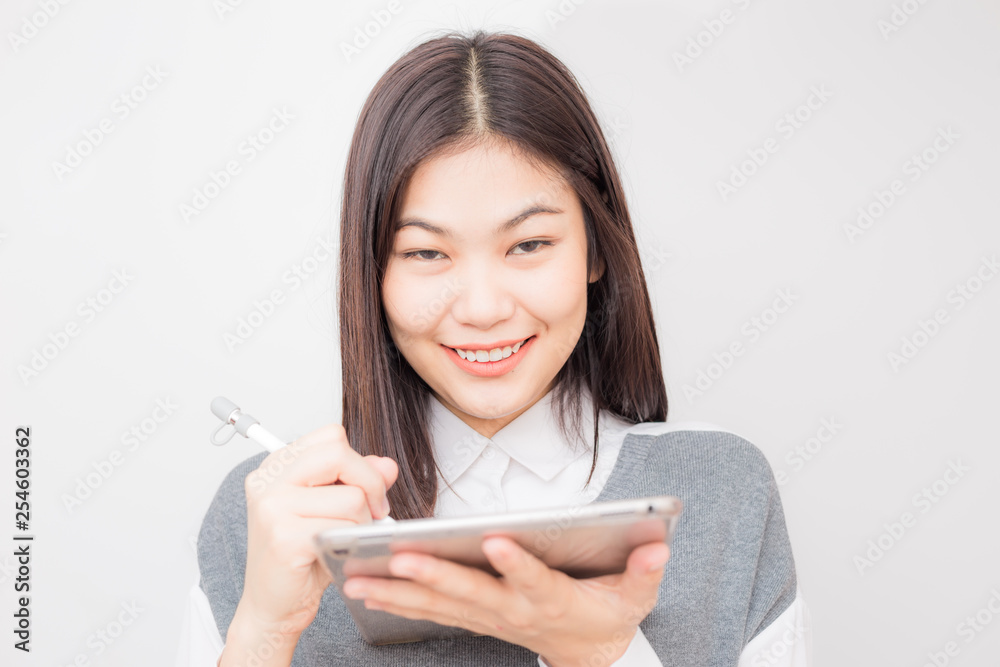 Happy young business women usea tablet computer Happy young business women usea tablet computer