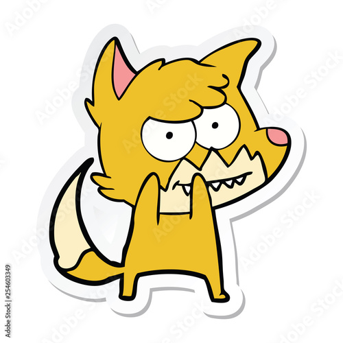 sticker of a cartoon grinning fox