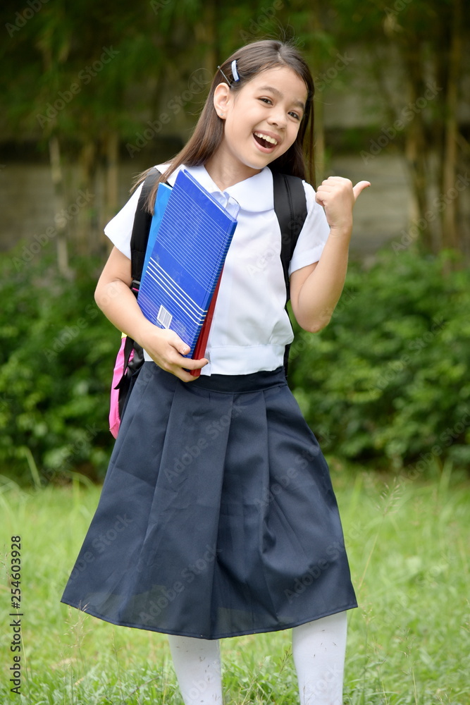 School Girl And Happiness Wearing Uniform With Notebooks School Girl And Happiness Wearing Uniform With Notebooks