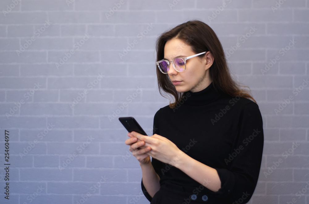 Young woman is chatting on the phone Young woman is chatting on the phone