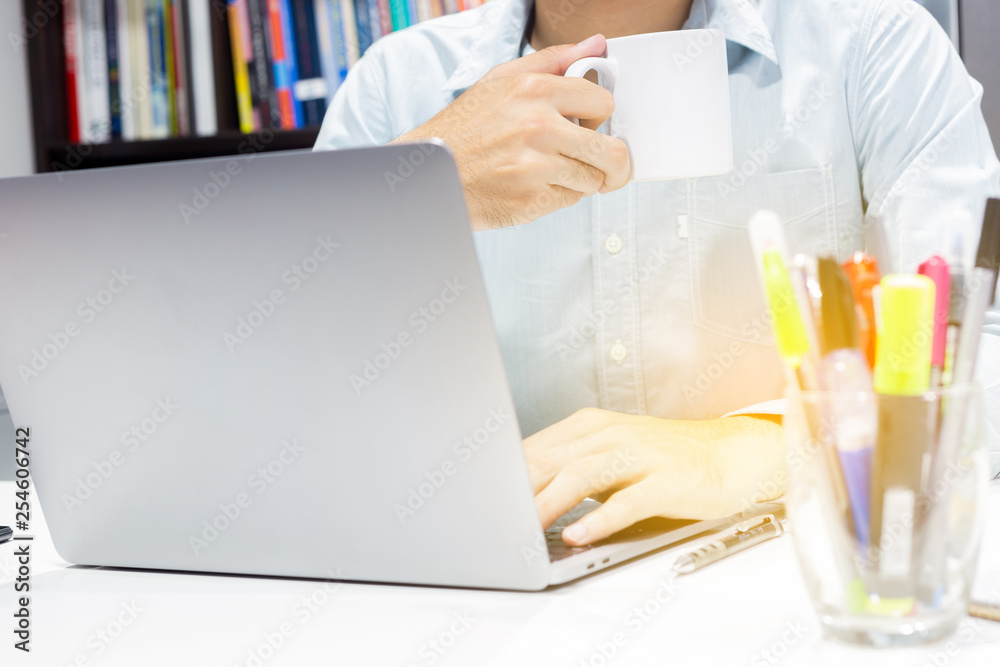 Businessman workspace and laptop with coffee cup at office room Businessman workspace and laptop with coffee cup at office room