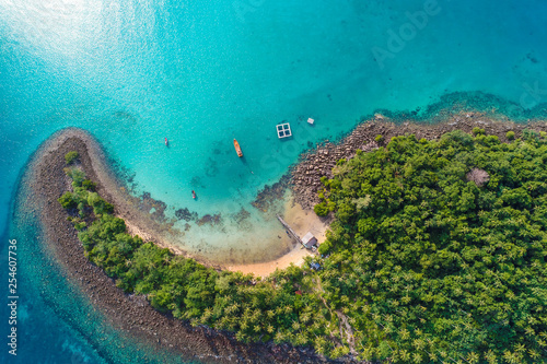 Fototapeta Naklejka Na Ścianę i Meble -  Amazing island with sand beach green tree forest aerial view