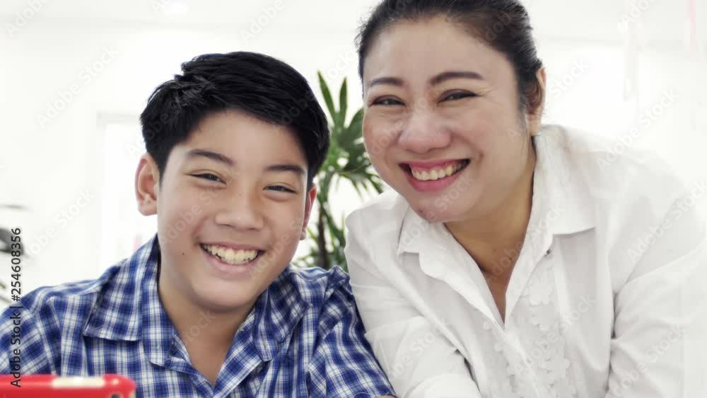 Portrait of asian family mother and son looking camera with smile face. Portrait of asian family mother and son looking camera with smile face.
