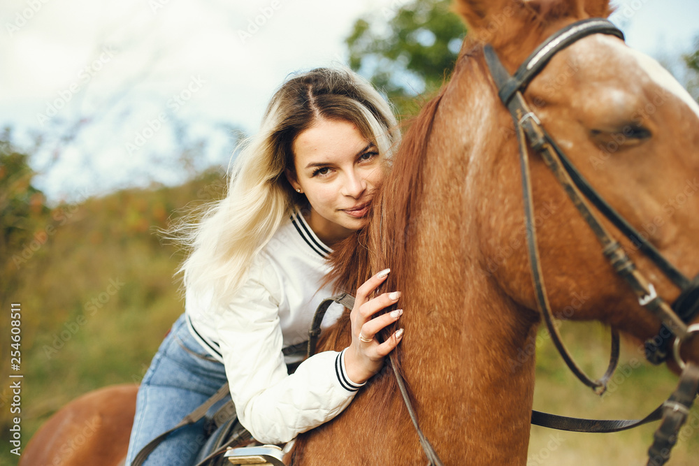 Obraz premium woman with horses