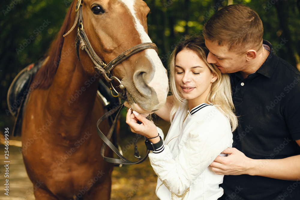 Obraz premium couple with horses