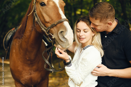 couple with horses