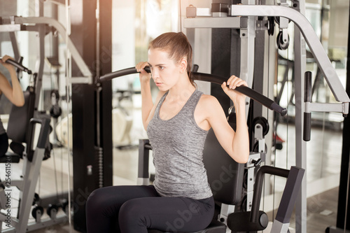 Pretty young sport woman is Workout in gym, Healthy lifestyle