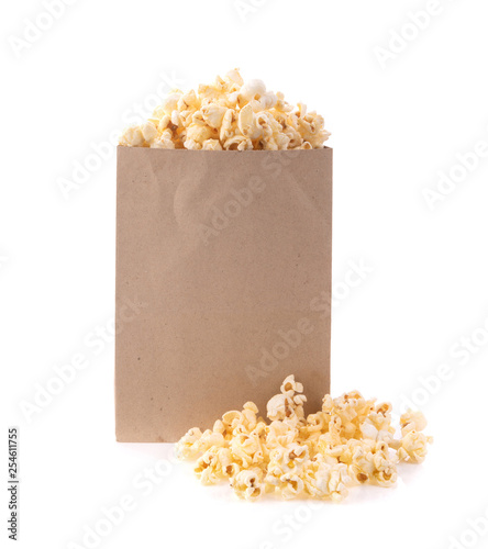 Popcorn in a paper bag on white background