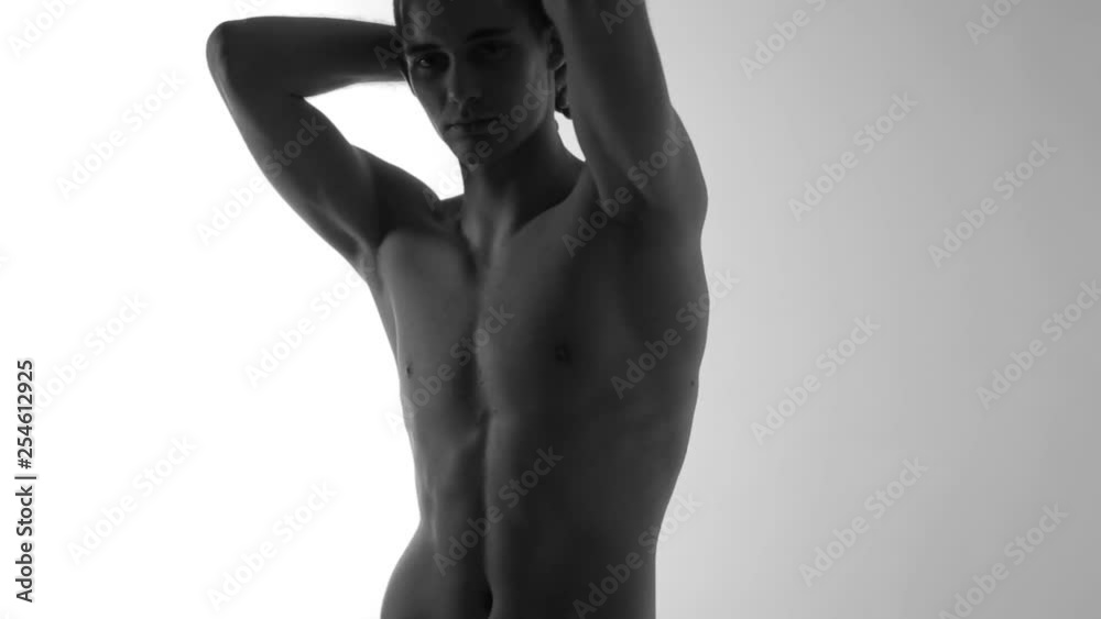 Portrait of a man in the studio close-up with a naked torso Portrait of a man in the studio close-up with a naked torso