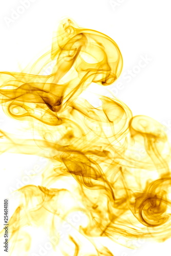 Yellow smoke on white background