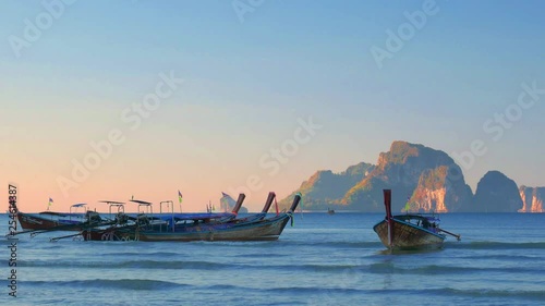 Ao Nang beach at sunset in Krabi Thailand