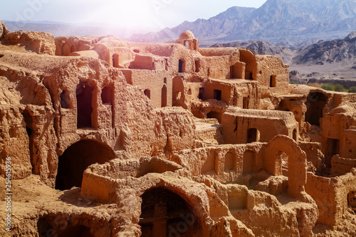 Ancient clay architecture in the abandoned village of Kharanagh. Persia. Iran. Sights Yazd. photo