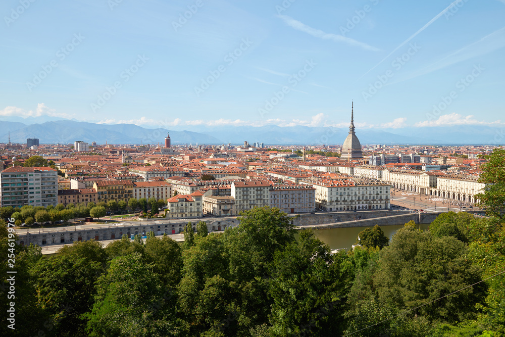 Turin skyline view and Mole Antonelliana tower seen from Cappuccini hill in a sunny summer day in Italy