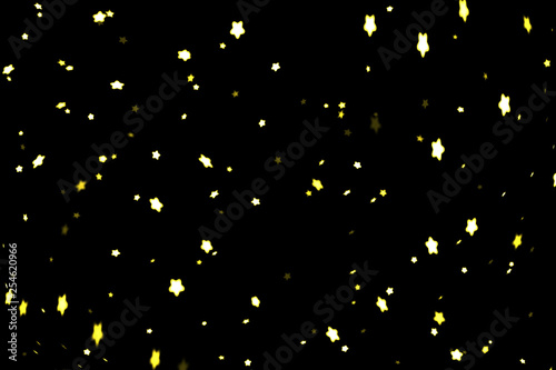 Glitter stars and dust overlay, abstract background, shiny light gold stars glitter