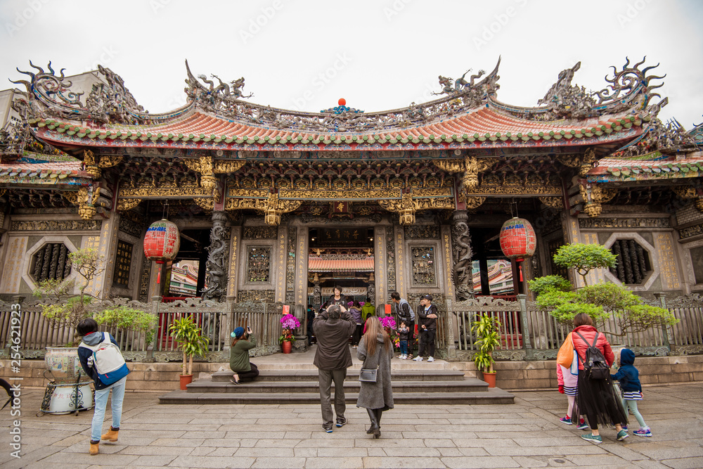 Taipei, Taiwan - January 27, 2019 - The temple of Longshan in downtown Taipei in Taiwan Taipei, Taiwan - January 27, 2019 - The temple of Longshan in downtown Taipei in Taiwan