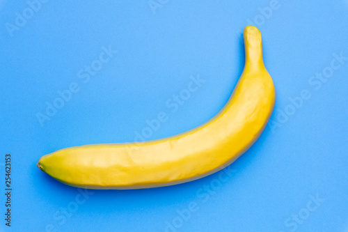 Minimal concept Banana fruit on colored blue pastel background. Creative concept.