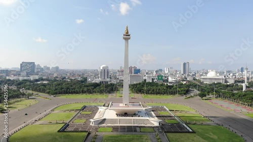 Aerial view clip of National Monument or also known as Monas, located in Jakarta, the capital city of Indonesia, recorded in 4k resolution.
