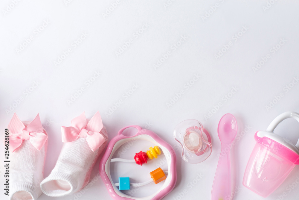 Flat lay composition with baby accessories and space for text on white background Flat lay composition with baby accessories and space for text on white background